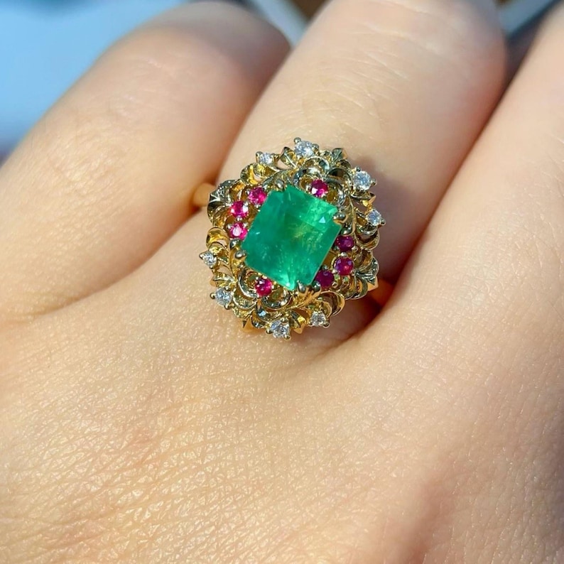 Emerald Cut Emerald & Ruby Halo Ring